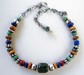 hand carved - stones by Africa John - combined with sterling silver - necklace design by Vicky Jousan