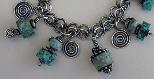 Peruvian Turquoise and Sterling Silver charm bracelet