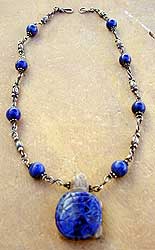 lapis lazuli and sterling silver carved turtle necklace with matching earrings by Vicky Jousan