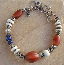 Antique carnelian, Lapis lazuli, Tibetan Naga Shell, Bali sterling silver necklace by Vicky Jousan